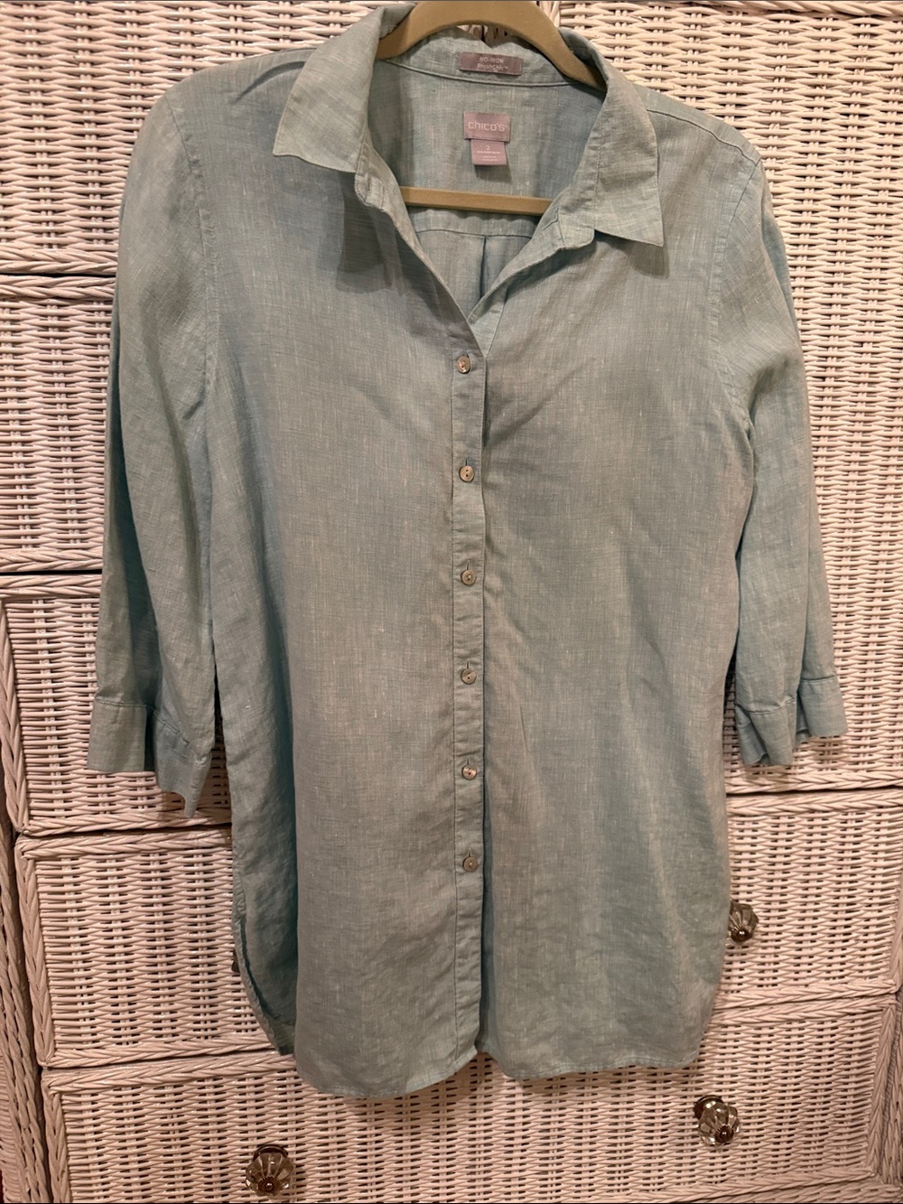 Chico’s linen sea foam green button down shirt.